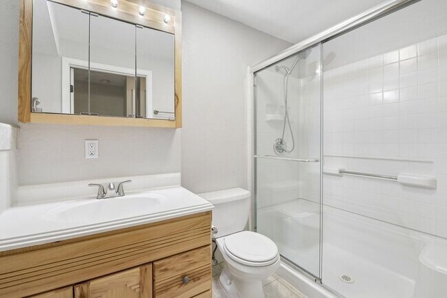 Building Photo - Townhome-Style Living with Greenbelt Views, Attached Garage & Community Pool!