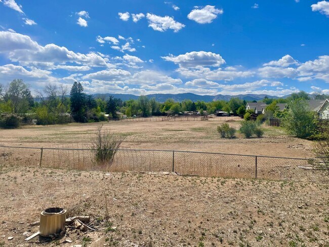 Building Photo - Expansive 5-bedroom, 2.5-bath home with incredible mountain views!