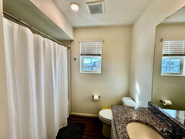 Building Photo - "Charming and spacious 3-Bed Sanctuary with 2.5 Baths the Reunion Community in Commerce City!"