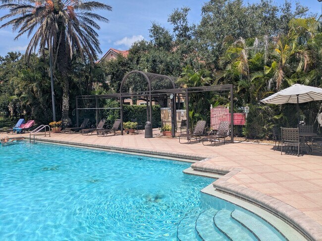 Building Photo - ANNUAL UNFURNISHED GROUND FLOOR CONDO 3 BED 2 BATH