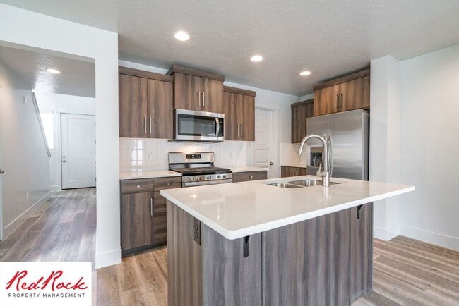 Building Photo - Innovative Design! 4 Bedroom Home in the Beautiful Desert Playa Community