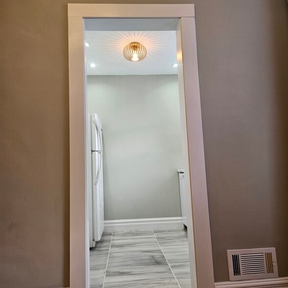 Doorway from main living room to Kitchen - 811 Tyler St