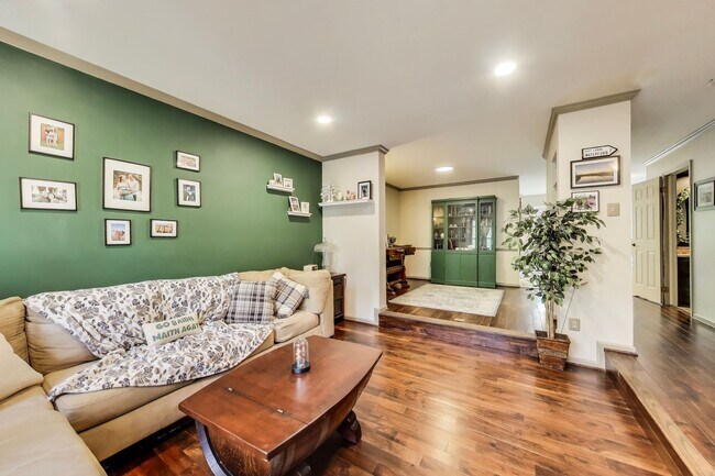 Building Photo - COMINGS SOON - Beautifully Updated Winchester-Built Townhome Backing to Serene Parkland.