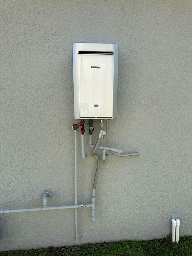 Building Photo - Nearly New 3 Bedroom Smart Home with Lawn Care Included!