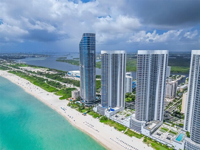 Building Photo - 15811 Collins Ave