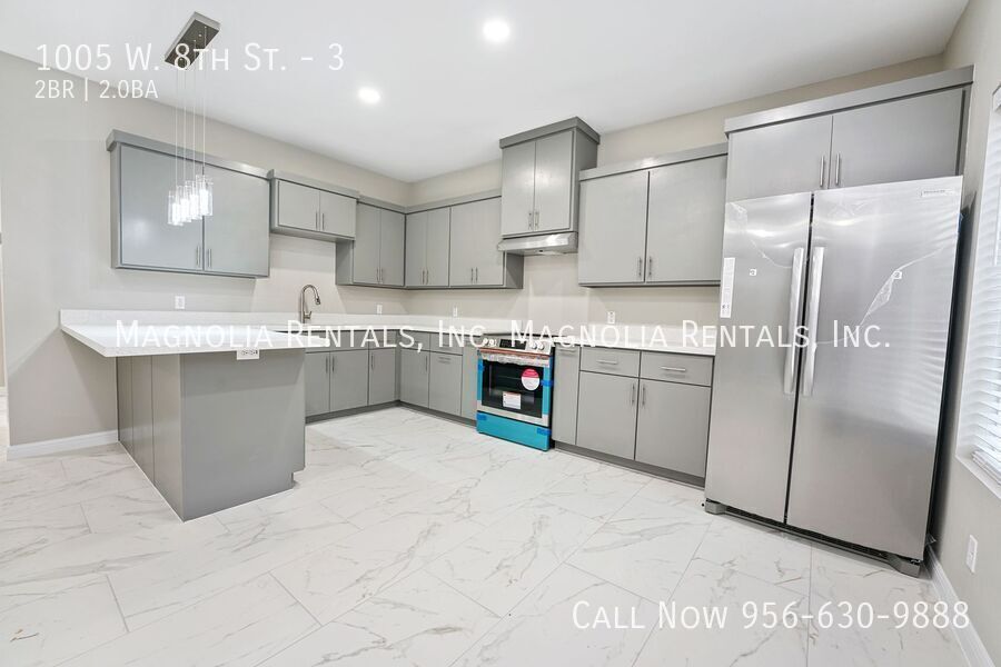 Building Photo - 1005 W 8th St