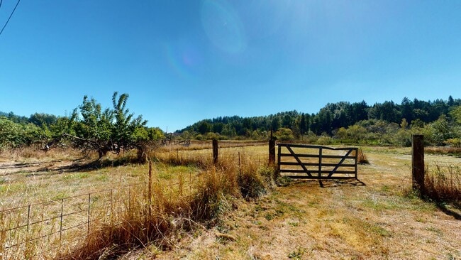 Building Photo - May Valley Road business opportunity available - 2 bedroom 1 bath home with carport & office and ...