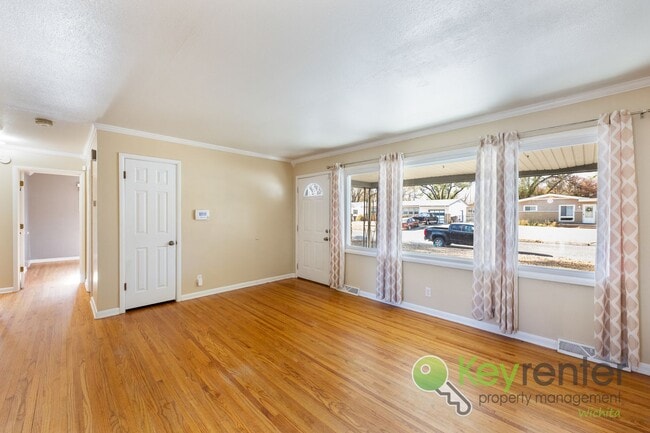 Building Photo - Inviting 3-Bedroom Home with Updated Kitchen & Fenced Backyard – Derby, KS