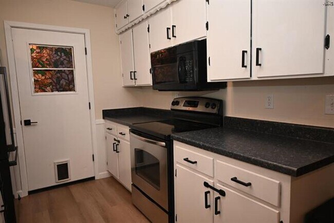 Building Photo - Spacious 4 Bedroom Brick Home Near Sheppard AFB with Fenced Backyard