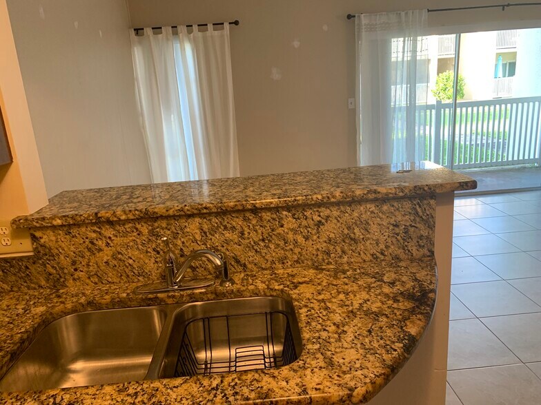 View from kitchen - 250 N Banana River Dr