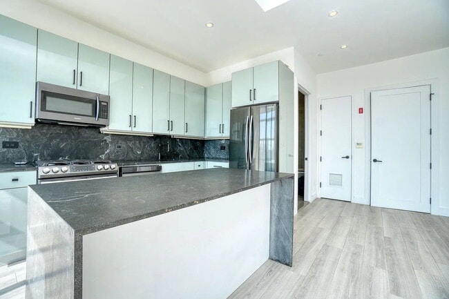 Building Photo - "Cozy 1-Bedroom Retreat in the Heart of Astoria – Your Perfect Urban Sanctuary!"