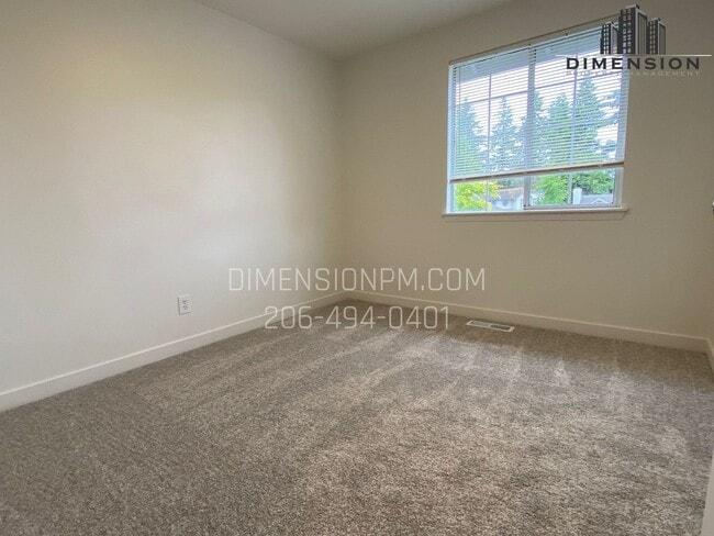 Building Photo - Stylishly Renovated Home with Private Back...