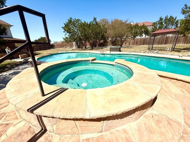 Building Photo - *COMING SOON* Luxurious 2-Story Home in Gated Stone Oak Community – Pool & Lawn Care Included