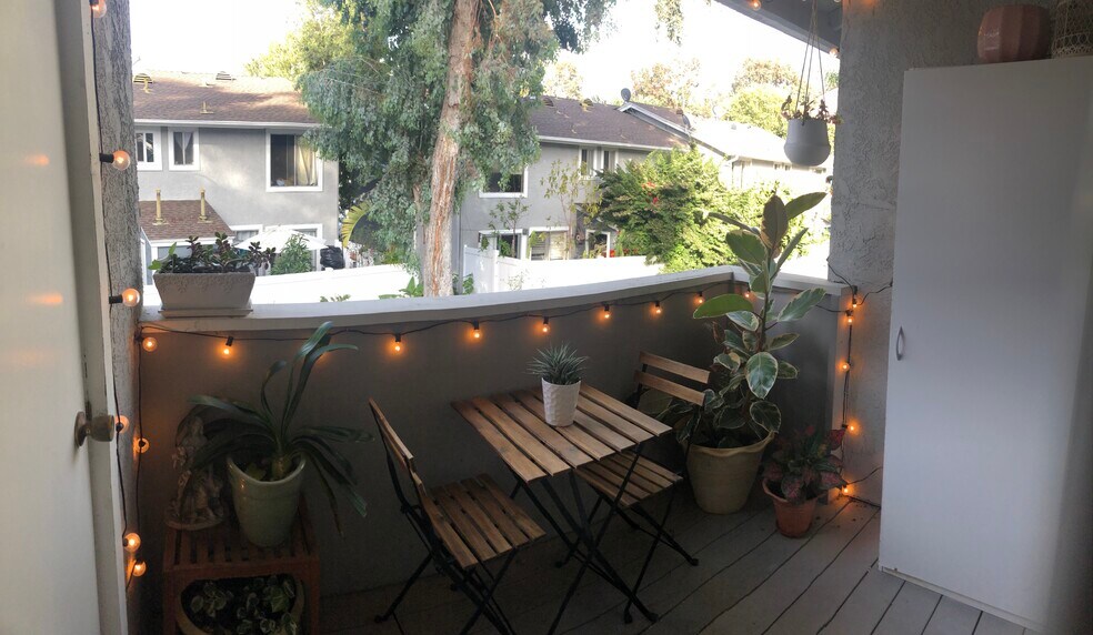 Large outdoor patio ideal for dining. - 23705 Sea Breeze Ln