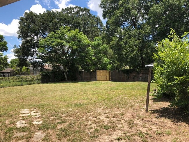 Building Photo - Spacious 3BR/1BA with Huge Yard & Charming...