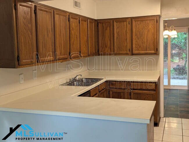 Building Photo - 4101-4105 Oaks Dr