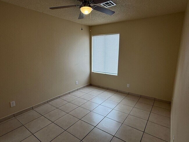 Building Photo - 2 Bedroom Fourplex on a Corner Lot with Large Yard