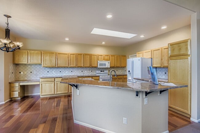 Building Photo - Spacious 4-Bedroom Home in Parker’s Desira...