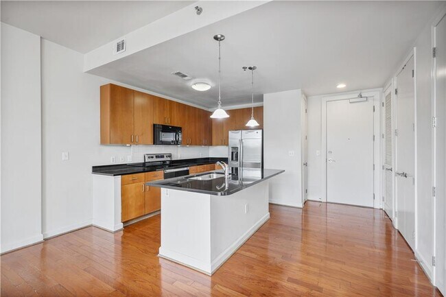 Building Photo - 711 Cosmopolitan Dr NE