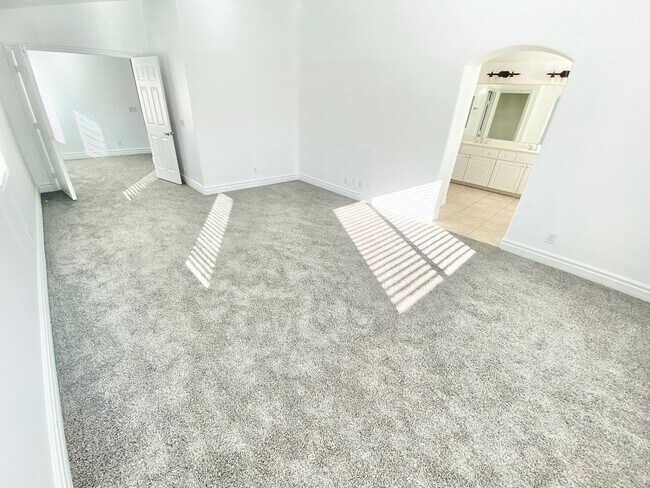Building Photo - STUNNING 2 STORY HOME IN A GUARD GATED COM...