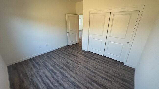 Building Photo - Coyote Run Duplexes 6000