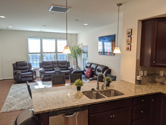 Building Photo - Bottom level (two story) *END UNIT* condo ...