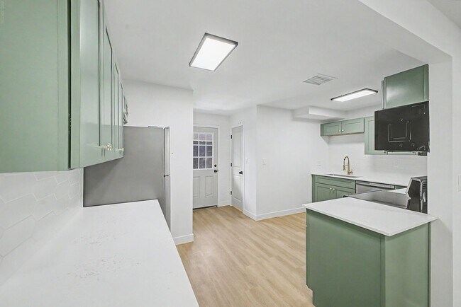 Building Photo - Spacious 2 Bed + Bonus Room | Large Private Yards | Covered Parking | 8 Weeks Free Rent!