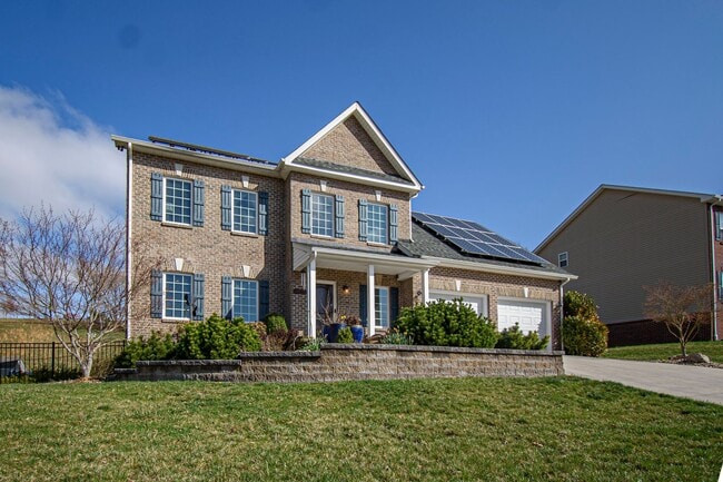 Building Photo - Spacious Home with Hot Tub, Fenced Yard and Solar Power