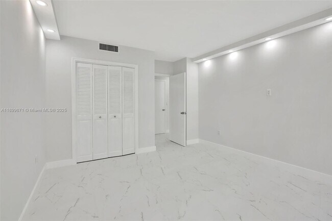 Building Photo - 9801 Collins Ave