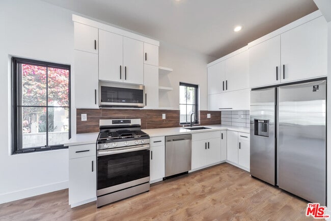 Building Photo - 1022 Masselin Ave