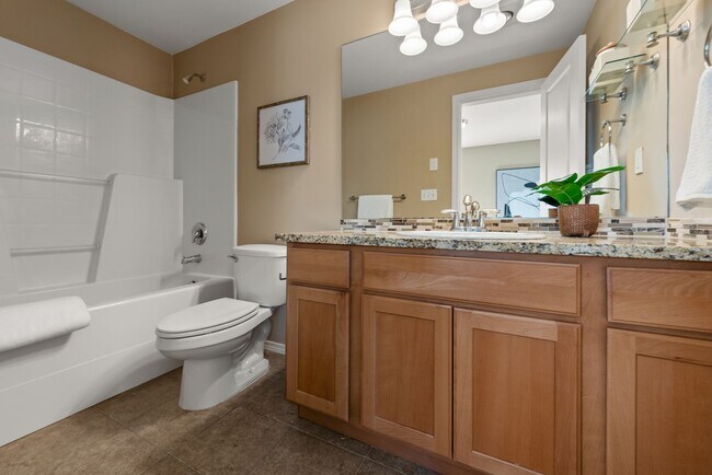 Building Photo - 4BR + Den Greenwood Home with Private Suite & 2-Car Garage