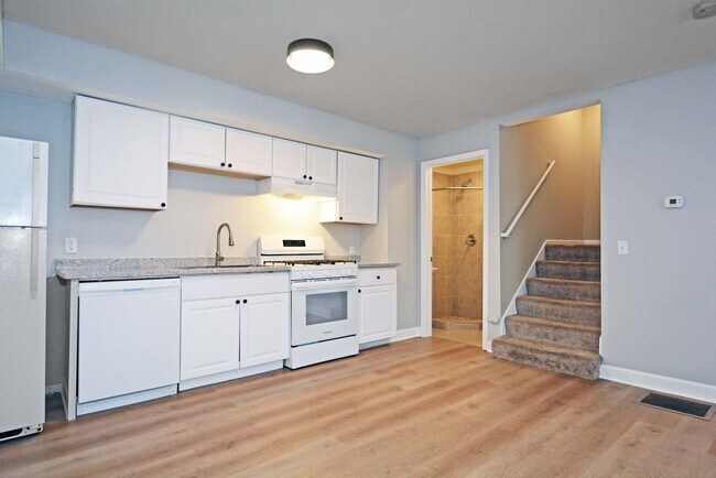 Building Photo - *$1,000 OFF Monthly Rent Through Summer!* Renovated 5-BR, 2-BA