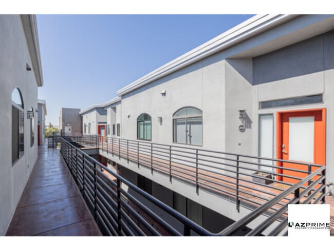 Building Photo - Top-floor living meets modern charm in thi...