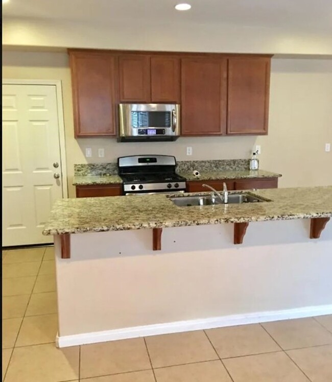 Building Photo - FOR RENT: Spacious 5-Bed Home with RV Park...