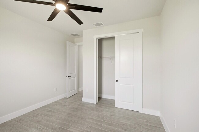 Building Photo - New 3/2 Pool Home for Rent on Canal, Fenced Yard, Pets Welcome. Your Dog Approves of This Backyard