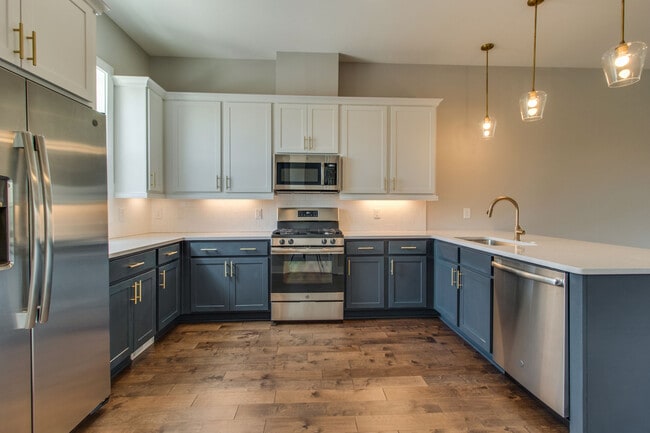 Plenty of cabinets and storage with a large farm sink over looking the main living and dining Great for Entertaining - 707 Vernon Ave