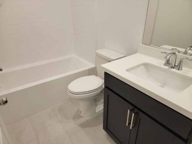 Building Photo - Stunning  4 Bedroom Townhome