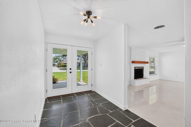 Building Photo - Welcome to this beautifully remodeled 4-bedroom, 3-bath home in the heart of Indialantic Beach!