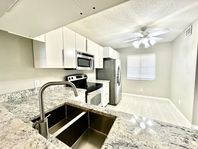 Building Photo - ** EMERALD LAKES ** 2 BED / 2 BATH CONDO - LAKE VIEW - CENTRAL NAPLES - ANNUAL RENTAL