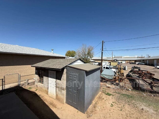 Building Photo - 1149 E 58th Ave