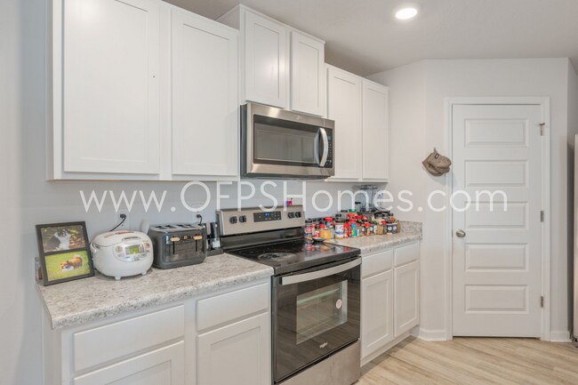 Building Photo - 4/2 in Pace Community!! AVAILABLE SEPTEMBER 2026!