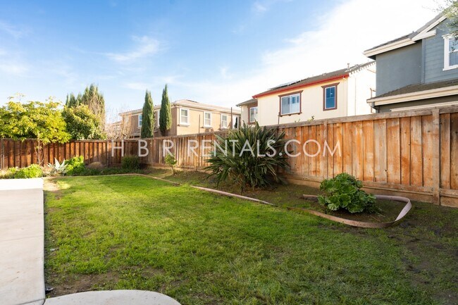 Building Photo - Spacious 4-Bed, 3-Bath Home with a Beautiful Garden in Mountain House! *FIRST FLOOR BEDROOM and F...