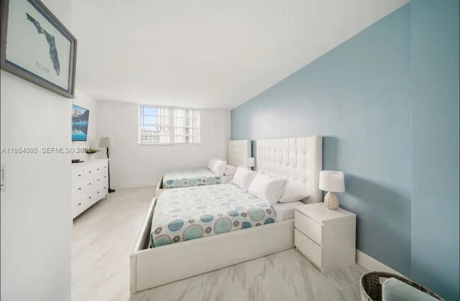 Building Photo - 19370 Collins Ave