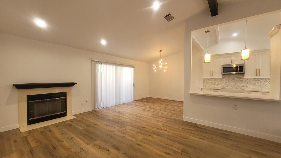 Living Room and Dining Area - 15340 Murray Ave
