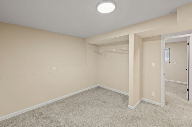 Building Photo - Spacious Split-Level Home with Finished Basement, Deck, Fenced Yard & 2-Car Garage