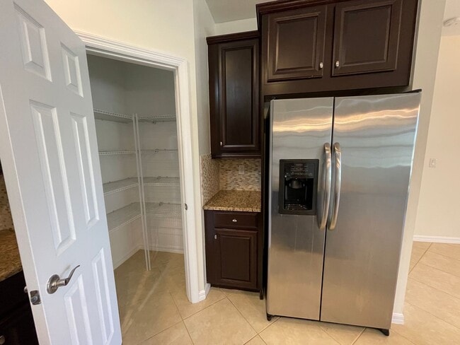 Building Photo - ANNUAL RENTAL - MIRASOL AT COCONUT POINT 3 BED/2 BATH WITH GARAGE