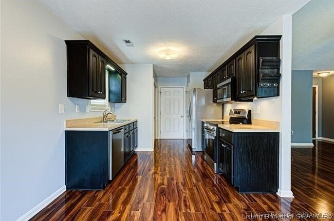 Building Photo - 5503 Harmony Wds Dr
