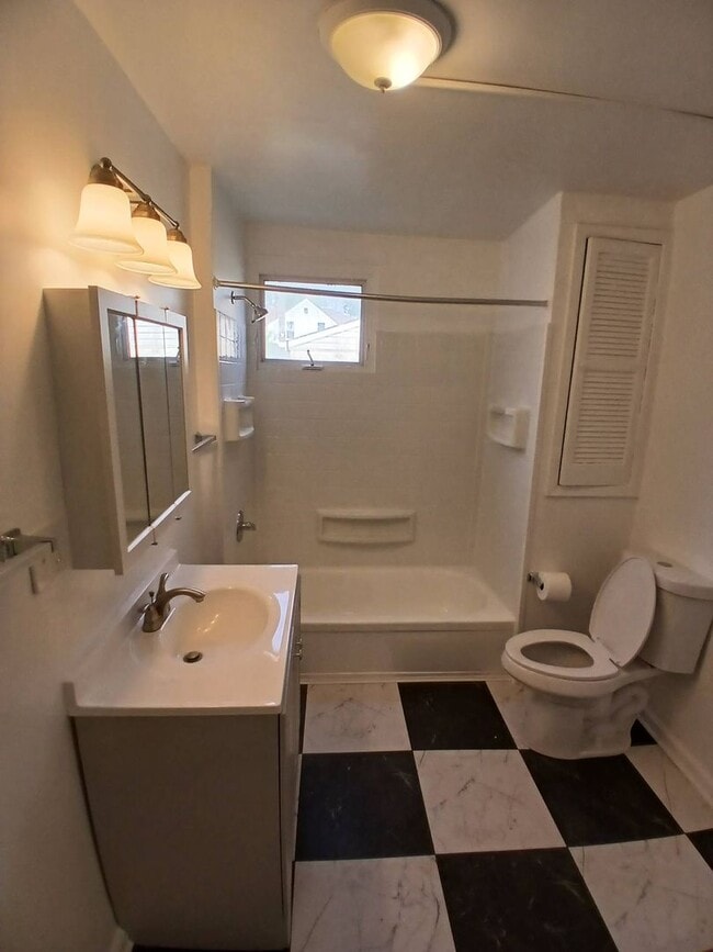 Building Photo - Newly Renovated 4BR/1BA Single-Family Home with Garage – Cleveland