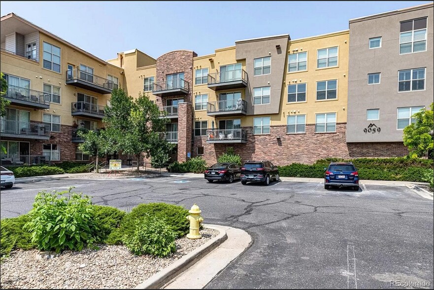Outside of Building and Parking Lot - 9059 E Panorama Cir