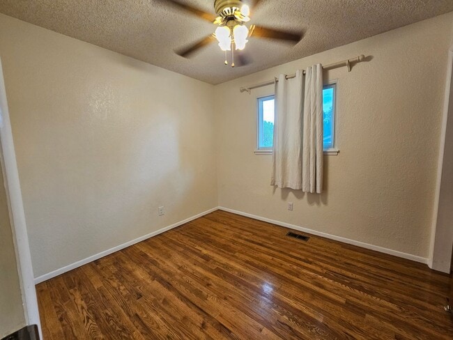 Building Photo - 4-Bedroom Home with In-Ground Pool, Solar ...